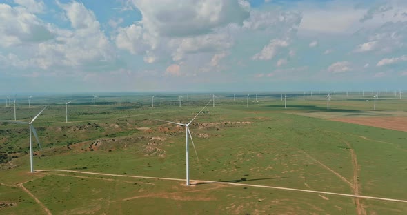 West Texas Field of a Larger Wind Farm with Panoramic View Wind Blade Generators alt