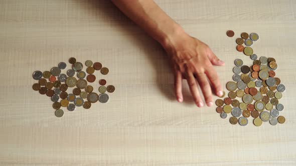 man sits at table at home and recalculates coins. financial crisis and poverty alt