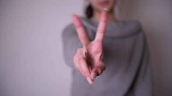 footage of hands gesture peace alt