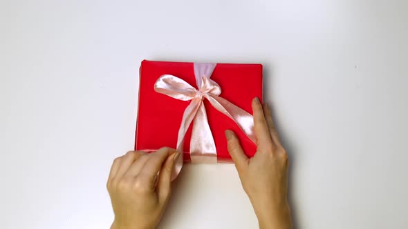 Woman Hand Unwrap a Gift Close Up, Stock Footage | VideoHive