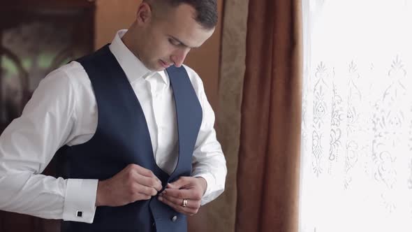 Handsome Groom Wearing a Jacket. Wedding Morning. Businessman alt