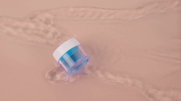 Rippling Water Surrounds Innovative Antiaging Moisturizing Gel in Glass Jar