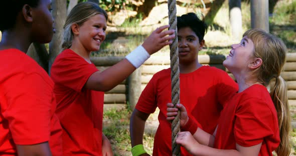 Kids interacting with each other during obstacle course alt