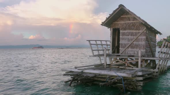 Evening Rainbow and Floating Hut