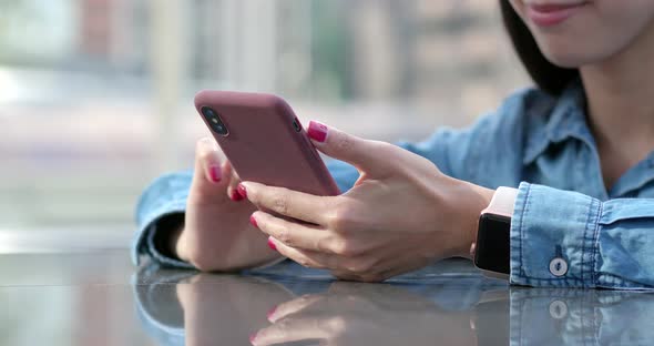 Woman use of smart phone at outdoor alt