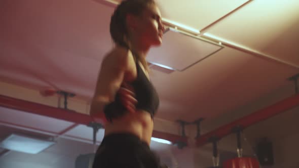 Female Fighter Trains and Jumping Rope, Coordination Training, Kickboxing Training Day in the Boxing alt