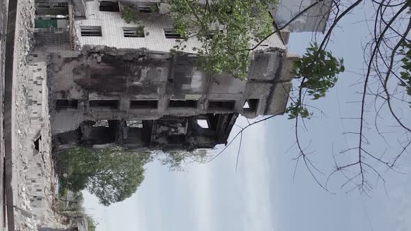 Vertical Video of a Residential Building Destroyed During the War in Ukraine alt