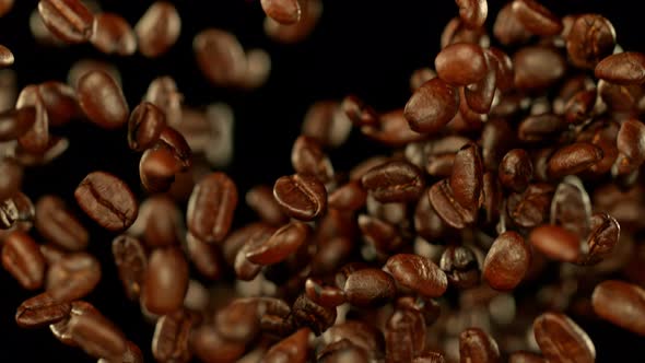 Super Slow Motion Shot of Exploding Premium Coffee Beans at 1000Fps alt