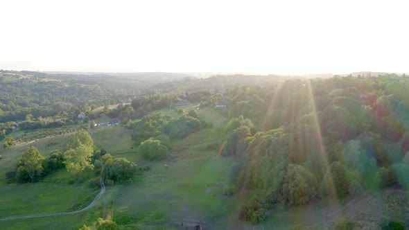 A modern European village in the foothills located on the slopes of the hills alt