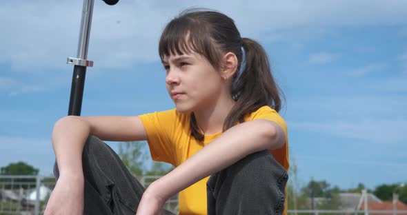 Active sport with a scooter.  alt