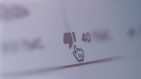 A Close Up Shot of Dislikes Being Counted on a Social Network Page alt
