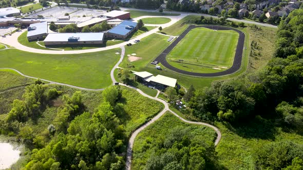 Track and Field Concept - Sports & Training Facility. Aerial Drone Flying View alt