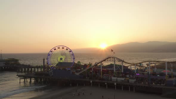 Elevating Rising Up Over Santa Monica Pier at Beautiful Golden Hour Sunset in California Right By alt