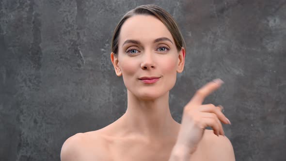 Naked Woman Showing Gesture Quiet Putting Finger to Lips alt