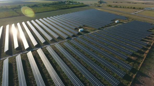 Aerial Shot of a Solar Power Station with Many Rows of Solar Panels in Ukraine 