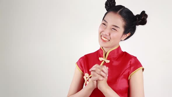 beautiful woman wear red cheongsam in concept of happy chinese new year alt
