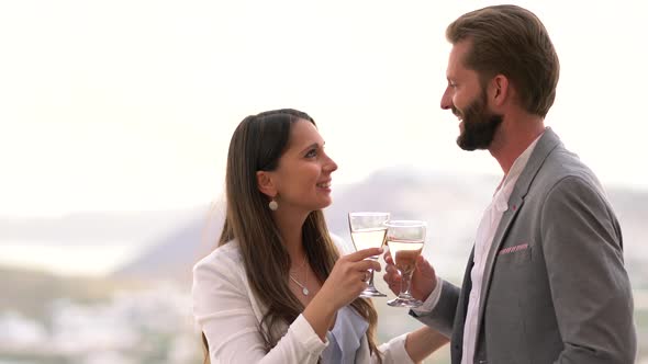 Couple Cheering With White Wine
