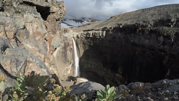 Scenery View of Powerful Mountain Waterfall on Active Volcano