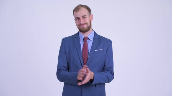 Happy Bearded Businessman Clapping Hands