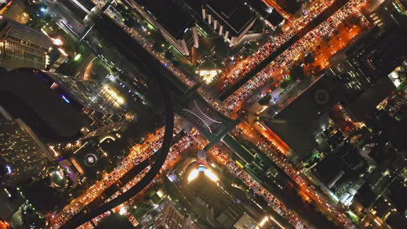 Aerial view of Sathorn intersection or junction with cars traffic, Bangkok Downtown. Thailand. alt