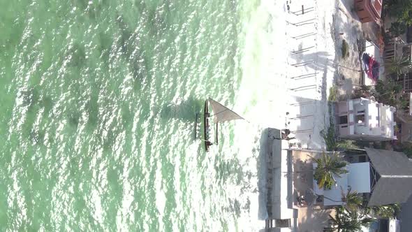 Tanzania Vertical Video  Boat Boats in the Ocean Near the Coast of Zanzibar Aerial View alt