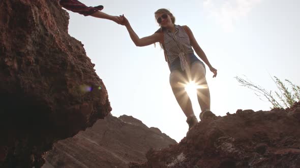 Woman Facing Challenge on Hiking Trip alt