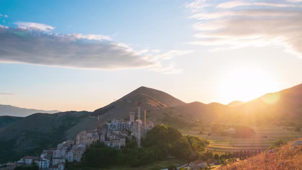 Time lapse: Sunset over medieval village perched on hill top, Santo Stefano di Sessanio, Abruzzo, It alt