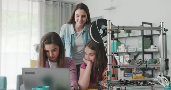 Girls learning 3D printing at home