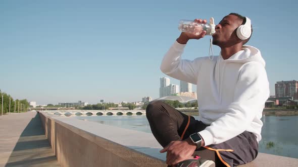 Man Drinking Water After Workout alt