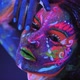 Girl Model Posing with UV Pattern on Body. Body Art Glowing in Ultraviolet Light - VideoHive Item for Sale