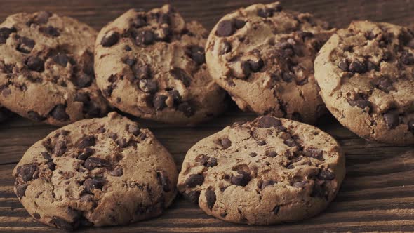 Chocolate cookies on wooden table. 