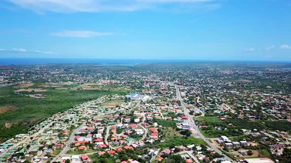 Tilt down aerial view of the Mahaai district in Willemstad, Curacao, Dutch Caribbean island alt