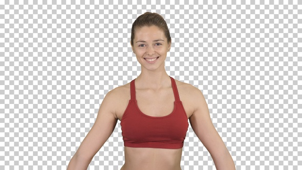 Young attractive woman practicing yoga sitting in Gomukasana alt