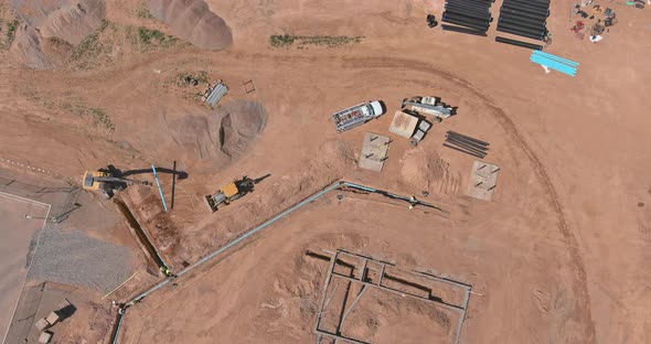 Aerial View New Residential Complex Buildings for Construction Work in the Laying Pipes in the alt