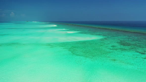 Luxury above copy space shot of a white paradise beach and aqua turquoise water background in colorf alt