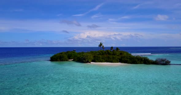 Wide angle drone abstract view of a paradise sunny white sand beach and blue sea background in colou alt
