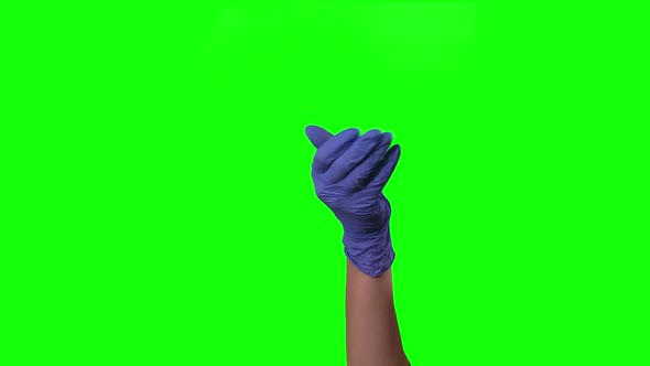 Doctor's Female Hand in Blue Glove Is Waving Welcoming You and Gesturing Come Here at Green Screen alt