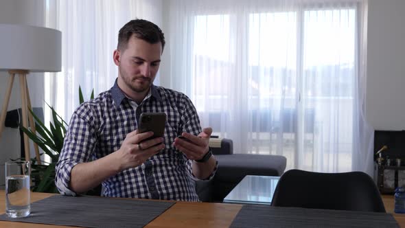 Young man is frustrated because he cannot complete the purchase online with his credit card alt