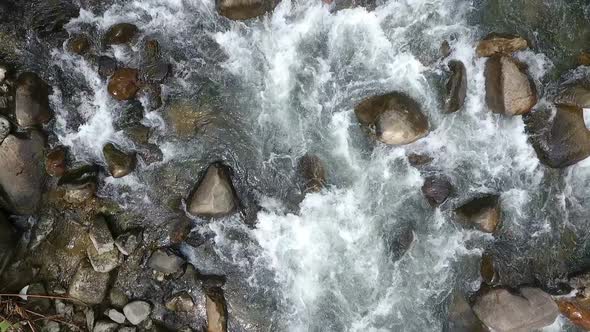 Aerial footage of river in forest alt