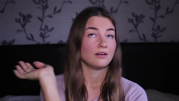 Teenage girl ignoring the conversation, not showing good manners alt