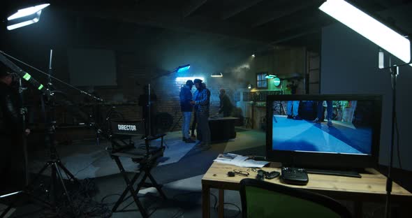 Director Using His Light Meter on a Film Set alt