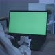 Closeup of a Laptop with a Green Screen in the Office in the Evening - VideoHive Item for Sale