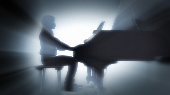 Silhouette Of A Man Playing Piano On The Background Of The Dramatic Light
