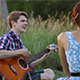 Guy Playing Guitar For His Girlfriend - VideoHive Item for Sale