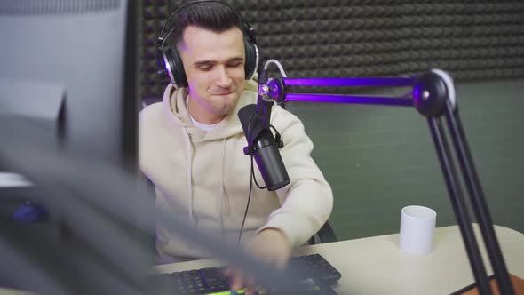 Funny Professional Radio Host with Headphones on Fun Live Streaming alt