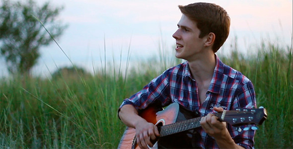 Young Guy Playing Guitar