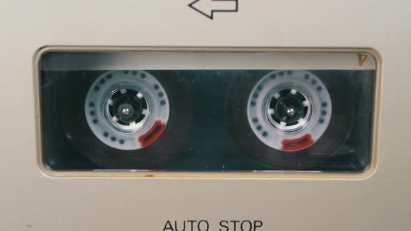 Audio Tape. Vintage Tape Recorder Plays Audio Cassette Inserted Therein alt