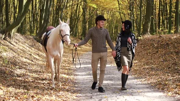 Happy family learning to ride alt