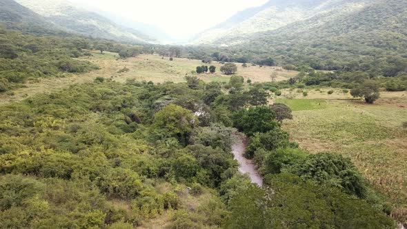 Aerial View of the Green Plains in Mountains, Tanzania, Africa. The the Green Hills Mountains in Eas alt