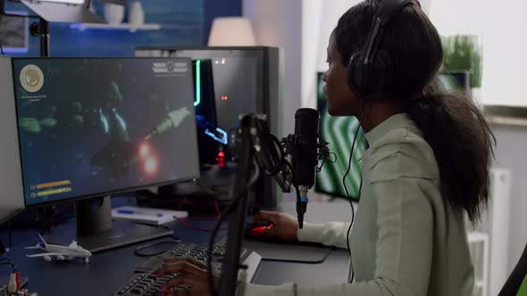 Furious Black Woman Gamer with Headphones Using Stream Chat Losing Game alt